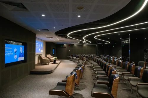 Curved-Light Modern Auditorium for Workshops and Presentations