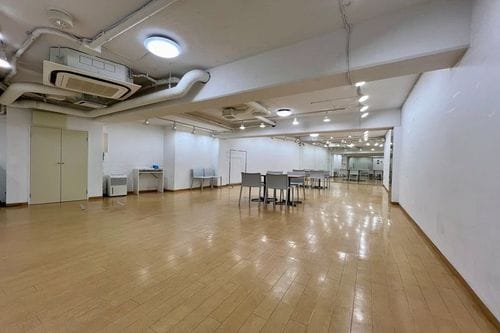 Sleek Minimalist Venue With Polished Wood Floors for Art Exhibits and Workshops