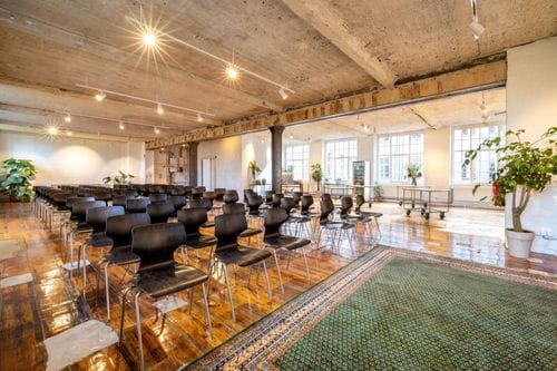 Sunlit Industrial Loft With Restored Wooden Floors for Vibrant Workshops
