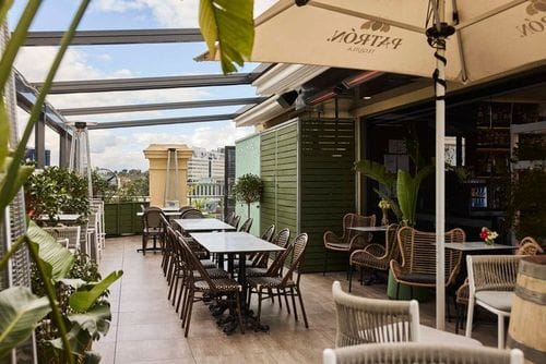 Enchanting Rooftop Lounge With Vertical Gardens and Stunning City Views for Corporate Celebrations