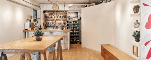 Timber-Clad Hideaway With Vintage Accents for Spirited Social Soirées