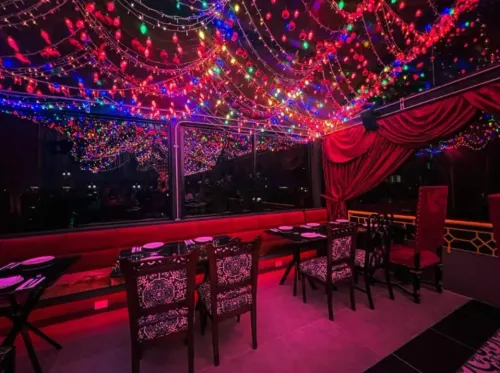Vibrant Indian-Inspired Rooftop With Multicoloured Lights for Unique Celebrations