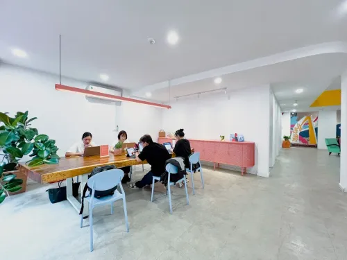 Colourful Co-Working Atrium With Rooftop Terrace for Workshops