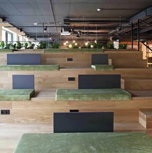 Tiered Wooden Amphitheatre With Plush Aesthetics for Dynamic Gatherings