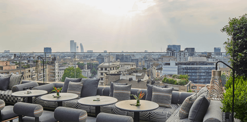 Glass-Wrapped Rooftop Lounge With Chic Decor for Exclusive Events