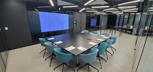 Luminous Boardroom with Touch-Screen Tech and Minimalist Design