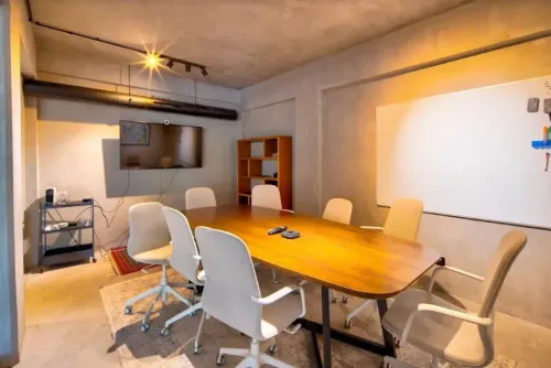 Minimalist Boardroom With an Industrial Flair for Intimate Corporate Sessions