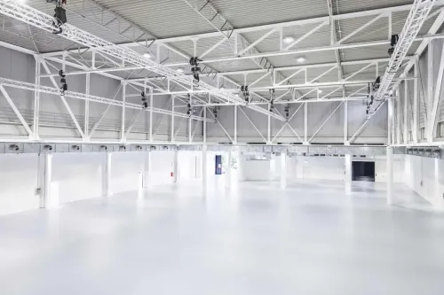 Expansive Industrial Hall for High-Impact Conferences and Conventions