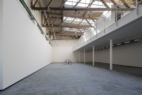An Industrial Gallery With Minimalist Aesthetic for Exhibitions and Creative Events