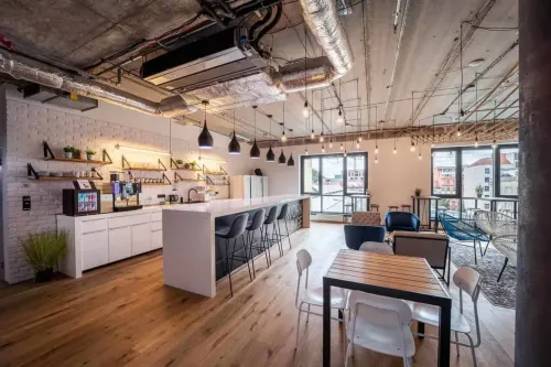 Urban Loft Lounge With Industrial Charm for Vibrant Corporate Mixers