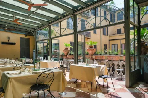 Glass-Enclosed Terrace With Elegant Interiors for Exclusive Dinners