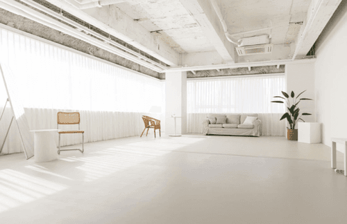 Chic All-White Studio With Natural Light for Photoshoots