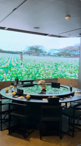 Contemporary Hidden Zen Nook With Bold LED Wall and Fixed Centrepiece for Intimate Gatherings