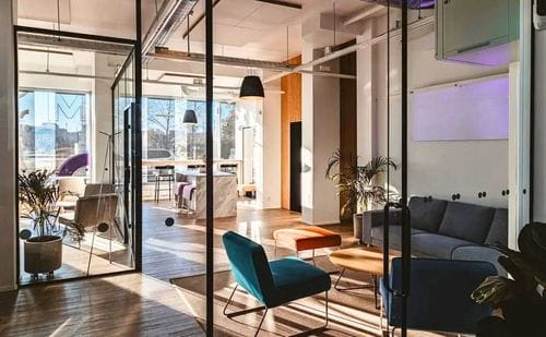Light-Filled Glass-Walled Lounge for Workshops and Networking