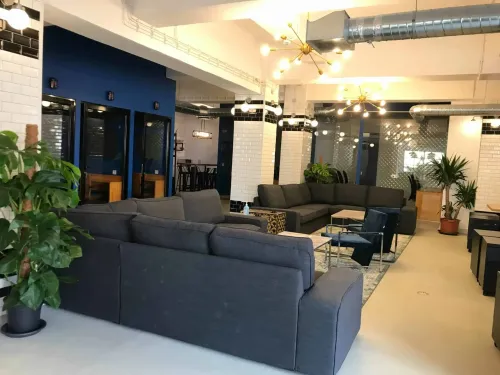 Scandinavian-Influenced Workspace With Industrial Chic Aesthetics for Dynamic Gatherings
