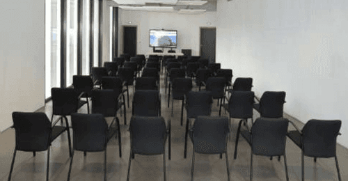 Elegant Functional Room With Floor-To-Ceiling Window for Presentations