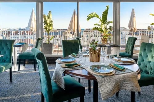 Beach Side Restaurant With Green Accents and Cosy Terrace for Dining