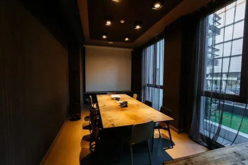 Sleek Boardroom With Floor-Ceiling Windows for Intimate Corporate Success