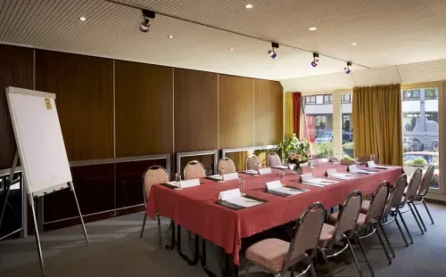 Intimate Wood-Panelled Boardroom for Strategic Meetings and Corporate Success