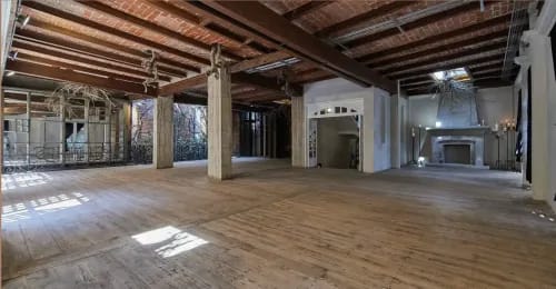 Industrial-Romantic Loft with Exposed Brick and Rustic Beams for Intimate Gatherings