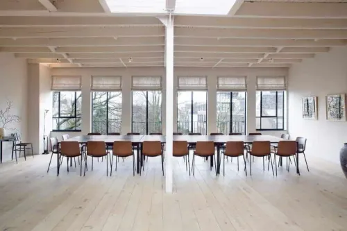 Homely Canal-Side Space With French Balconies & Skylights for Inspiring Meetings
