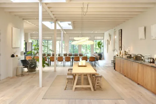 Sleek Light-Filled Loft With Skylights for Team Meetings 