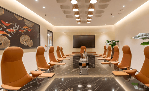 Marble-Topped Boardroom With Sculpted Ceiling for Strategy Sessions