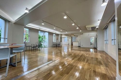 Serene Space With Polished Wooden Floors and Green Balcony for Inspiring Events