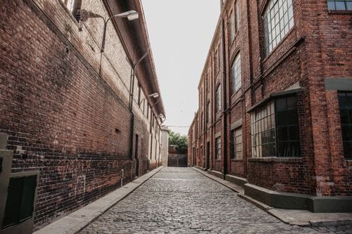 A Unique Open-Air Setting in a Brick-Lined Industrial Street for Impactful Occasions