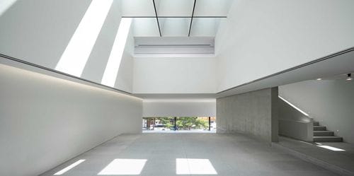 Sleek Contemporary Venue with Skylights and Bright White Walls for Memorable Events