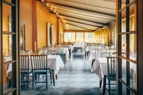 Sunlit Veranda With Classic Elegance for Intimate Corporate Dinners