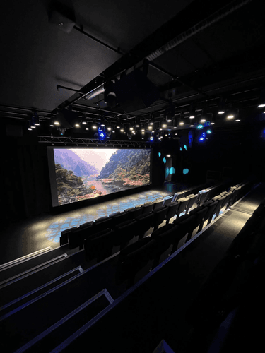 Contemporary Auditorium With Full-Width LED Screen for Presentations