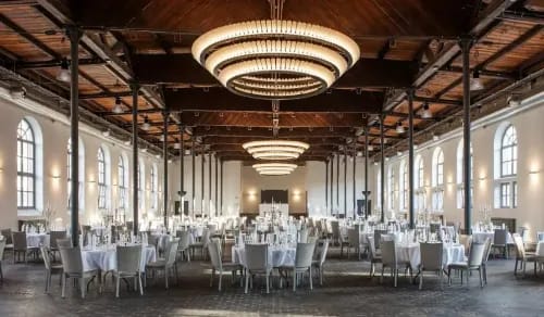 Revitalised Industrial Ballroom With Striking Chandeliers for Exclusive Galas