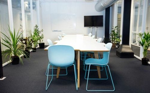 Modern Meeting Room With Lush Greenery for Brainstorming Sessions