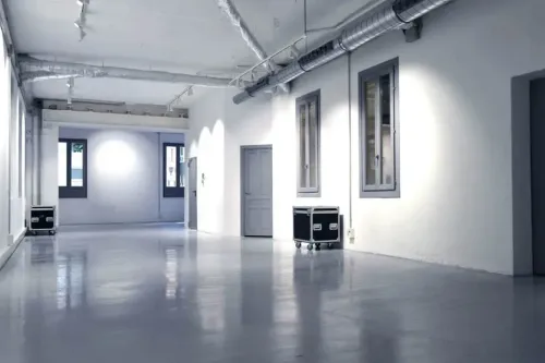 Urban Industrial Venue With Sleek White interiors for Creative Projects