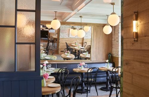 Brickwork Bistro With Vintage Elegance and Outdoor Terrace for Gatherings