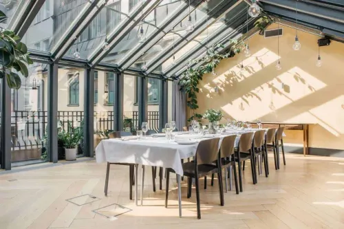 Sunlit Contemporary Glasshouse for Elegant Dinner Parties