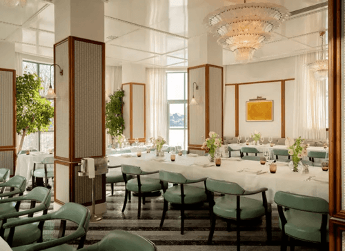 Waterfront Dining Room With Retro Glam and Verdant Charm for Elegant Corporate Events