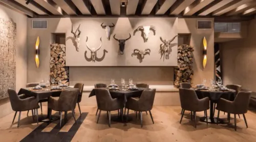 Rustic Luxe Dining Space With Tribal Elegance for Upscale Receptions