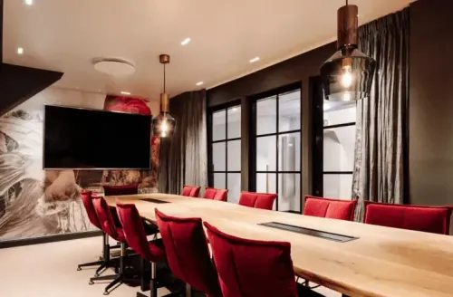 Red Velvet Boardroom With an Artistic Edge for Inspiring Meetings