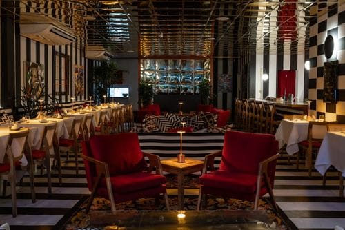 Elegant and Vibrant Red-Themed Venue for Sophisticated Private Events