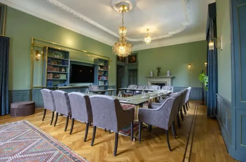 Refined Heritage Room With an Elegant Fireplace for Board Meetings