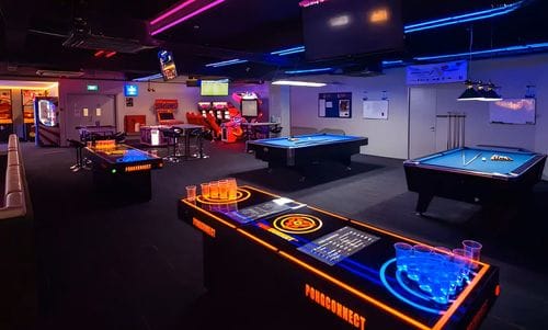Neon-Lit Entertainment Hall With Karaoke and Games for Parties