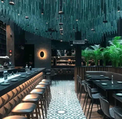 Stylish Green Haven With Iconic Glass Ceiling for Gourmet Dining and Celebrations