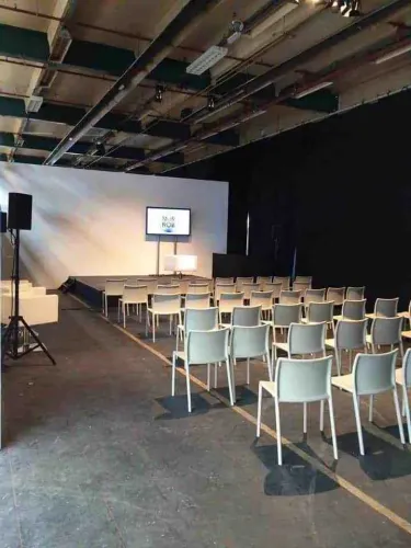 Industrial Chic Hall With an Outdoor Terrace for Dynamic Hackathons