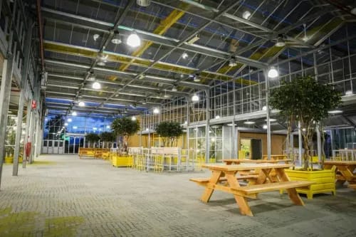 Repurposed GreenHouse With an Industrial Flair for Grand Social Events