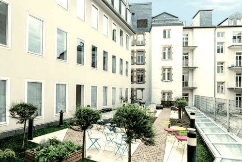 Intimate Terrace Nestled Among Buildings for Small Receptions