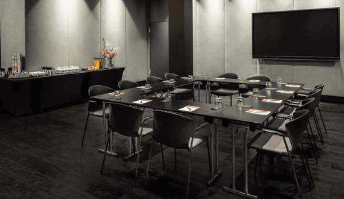 Contemporary Meeting Room with Integrated Presentation Screen