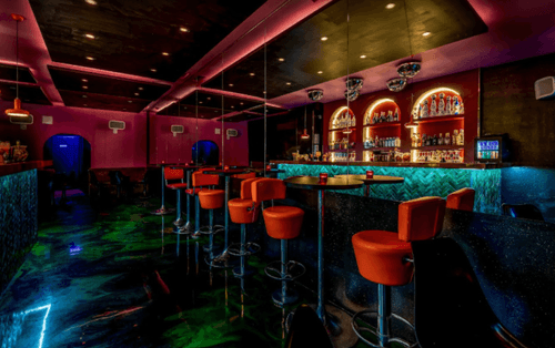 Captivating Retro-Chic Bar Featuring Unique Drinks and Disco Decor