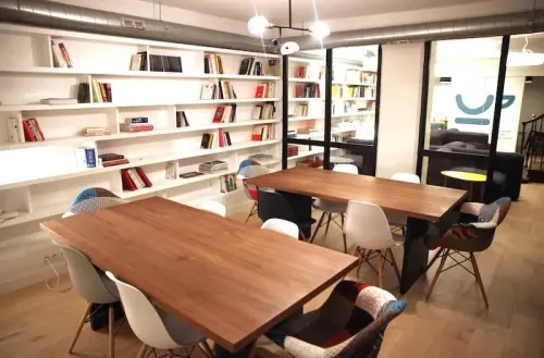 Chic Basement Library Space With Wooden Accents for Intimate Gatherings